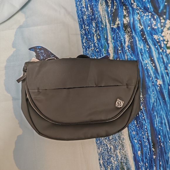 lululemon athletica Handbags - Lululemon All Night Festival Bag 5L silver